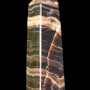 Chocolate Calcite obelisk 119*32mm 270g in UV light  - Rocks and Things Store