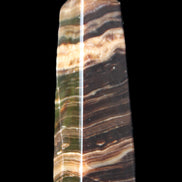 Chocolate Calcite obelisk 119*32mm 270g in UV light  - Rocks and Things Store