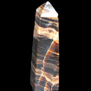 Chocolate Calcite obelisk 119*32mm 270g in UV light  - Rocks and Things Store