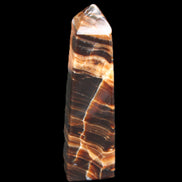 Chocolate Calcite obelisk 119*32mm 270g in UV light  - Rocks and Things Store