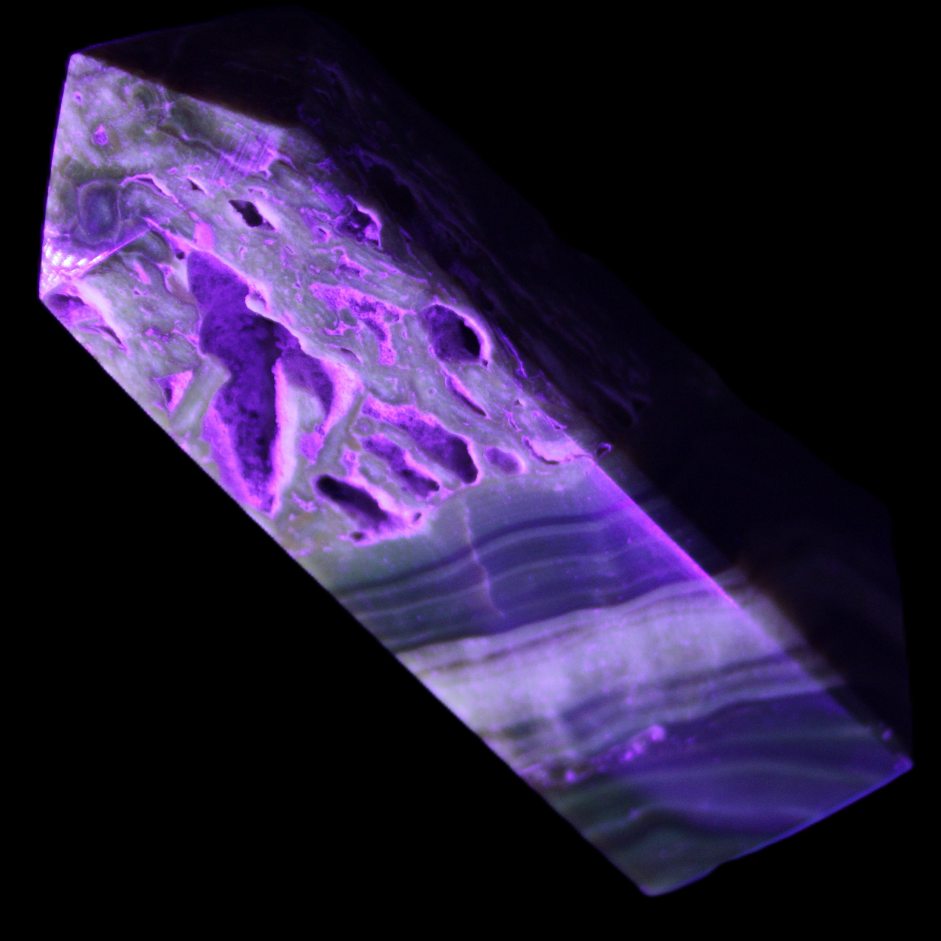 Chocolate Calcite obelisk 111*35mm 208g in UV light - Rocks and Things Store
