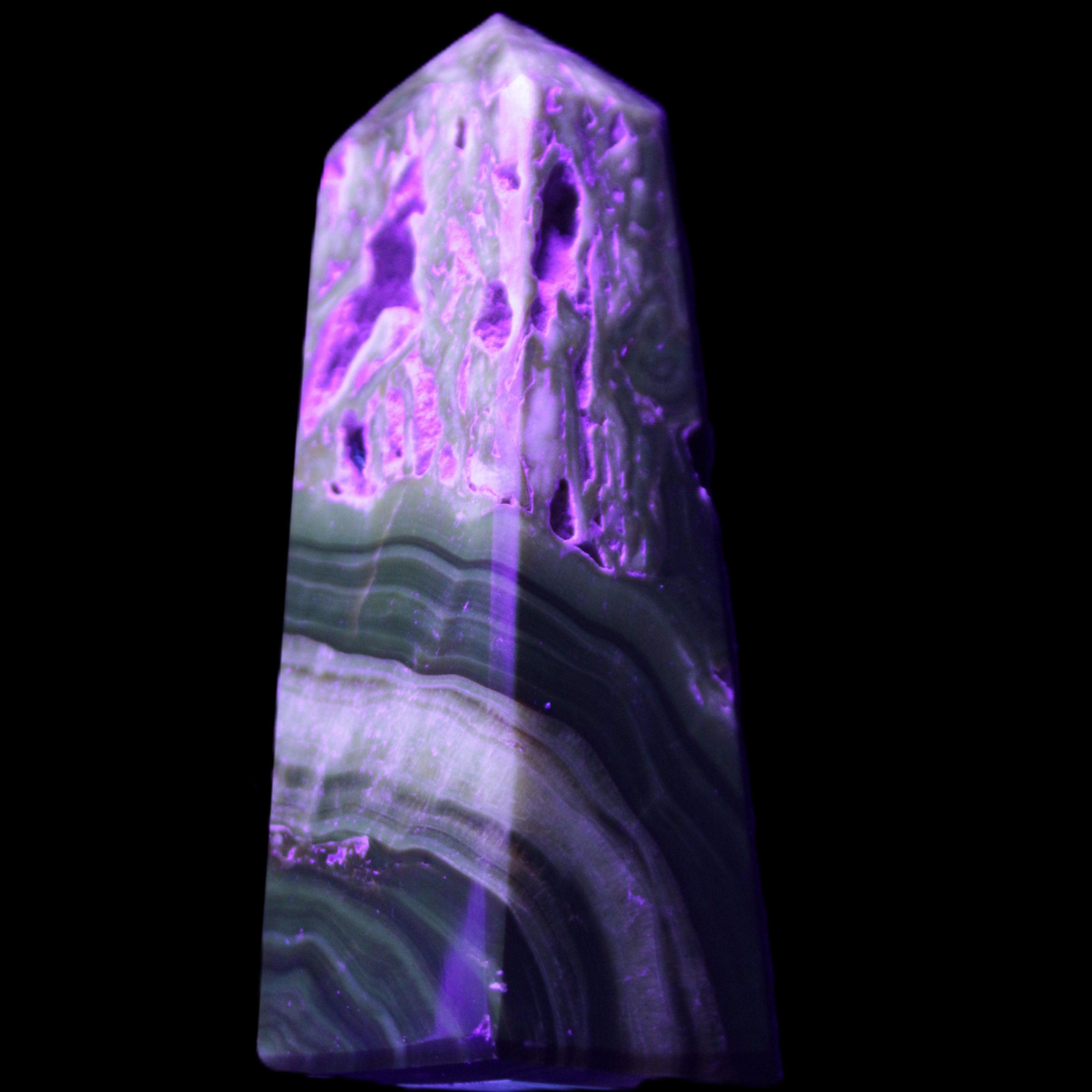 Chocolate Calcite obelisk 111*35mm 208g in UV light - Rocks and Things Store