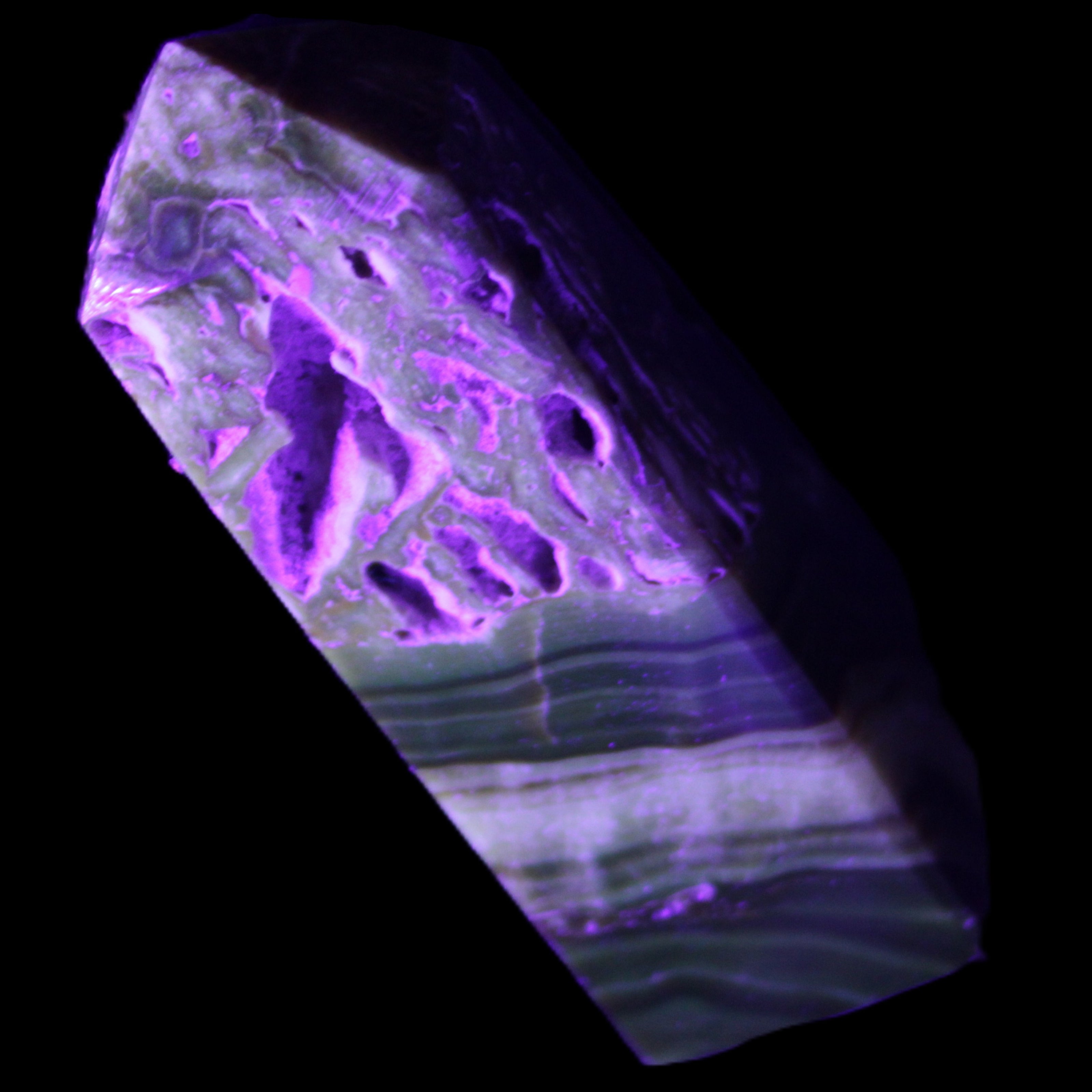 Chocolate Calcite obelisk 111*35mm 208g in UV light - Rocks and Things Store