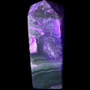 Chocolate Calcite obelisk 111*35mm 208g in UV light - Rocks and Things Store