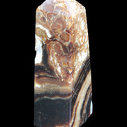 Chocolate Calcite obelisk 111*35mm 208g in UV light - Rocks and Things Store
