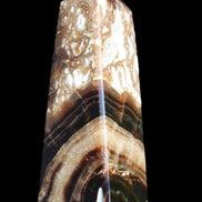 Chocolate Calcite obelisk 111*35mm 208g in UV light - Rocks and Things Store