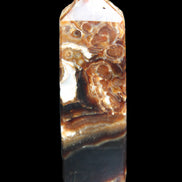 Chocolate Calcite obelisk 111*35mm 208g in UV light - Rocks and Things Store