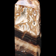 Chocolate Calcite obelisk 111*35mm 208g in UV light - Rocks and Things Store