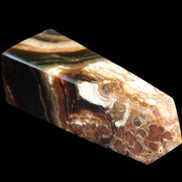 Chocolate Calcite obelisk 111*35mm 208g in UV light - Rocks and Things Store
