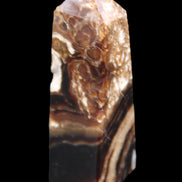 Chocolate Calcite obelisk 111*35mm 208g in UV light - Rocks and Things Store