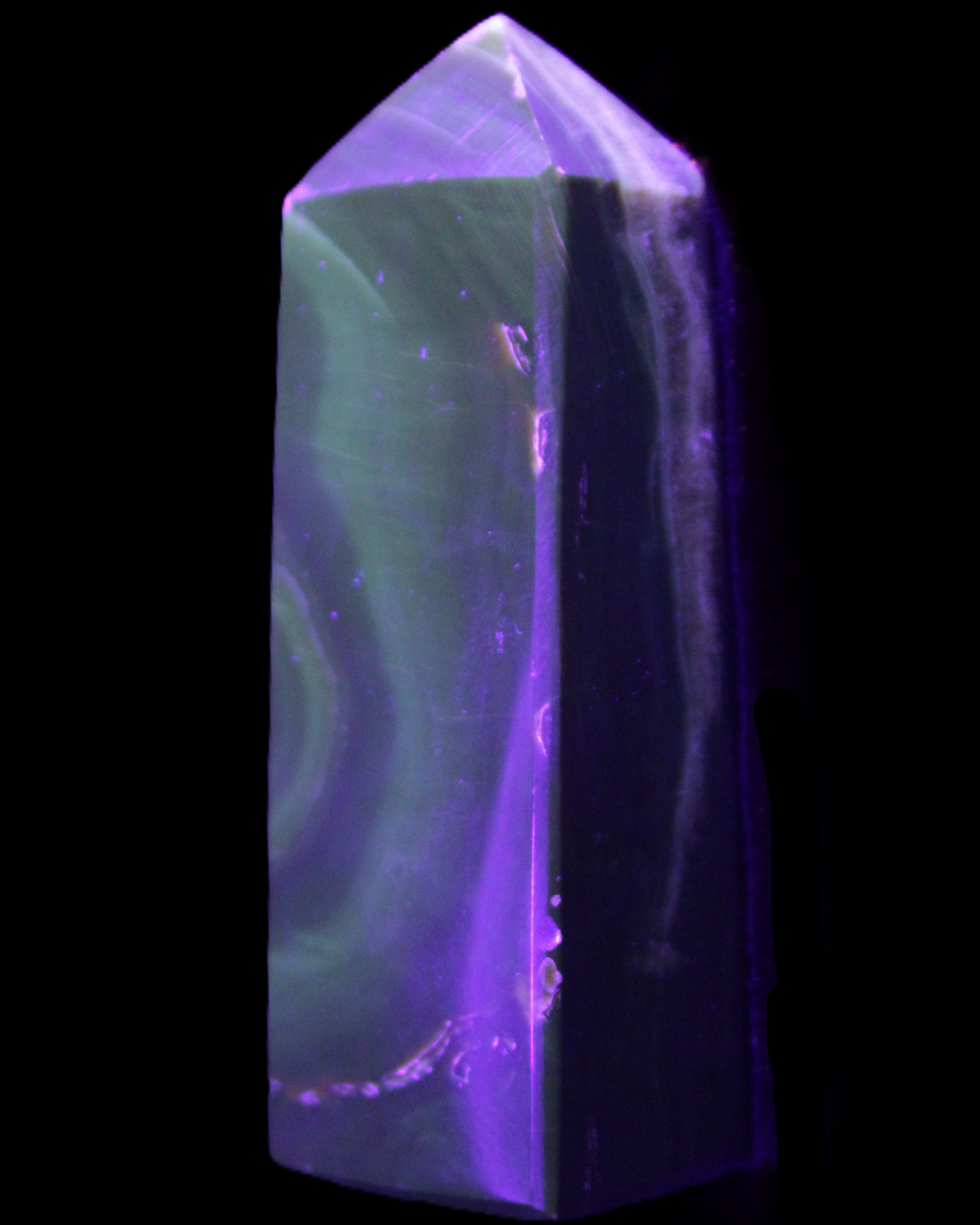 Chocolate Calcite obelisk 93*33mm 177g in UV light - Rocks and Things Store
