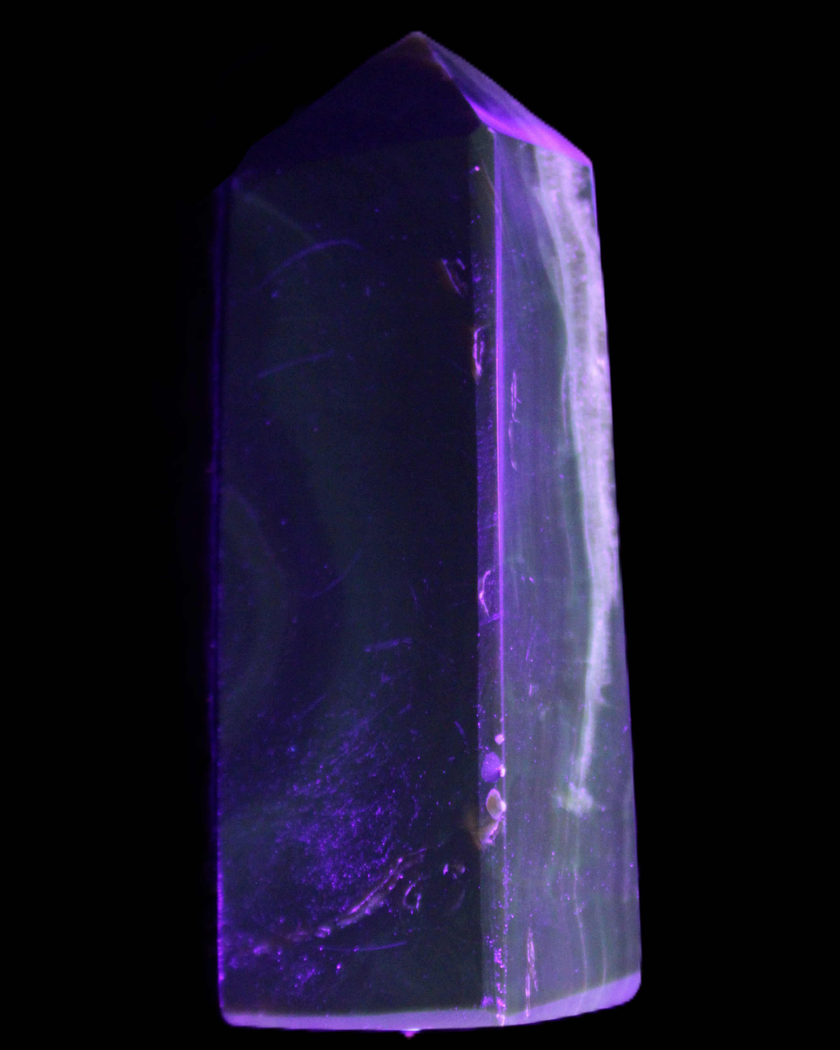 Chocolate Calcite obelisk 93*33mm 177g in UV light - Rocks and Things Store