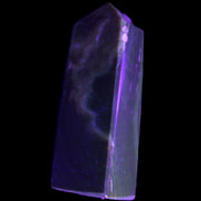 Chocolate Calcite obelisk 93*33mm 177g in UV light - Rocks and Things Store