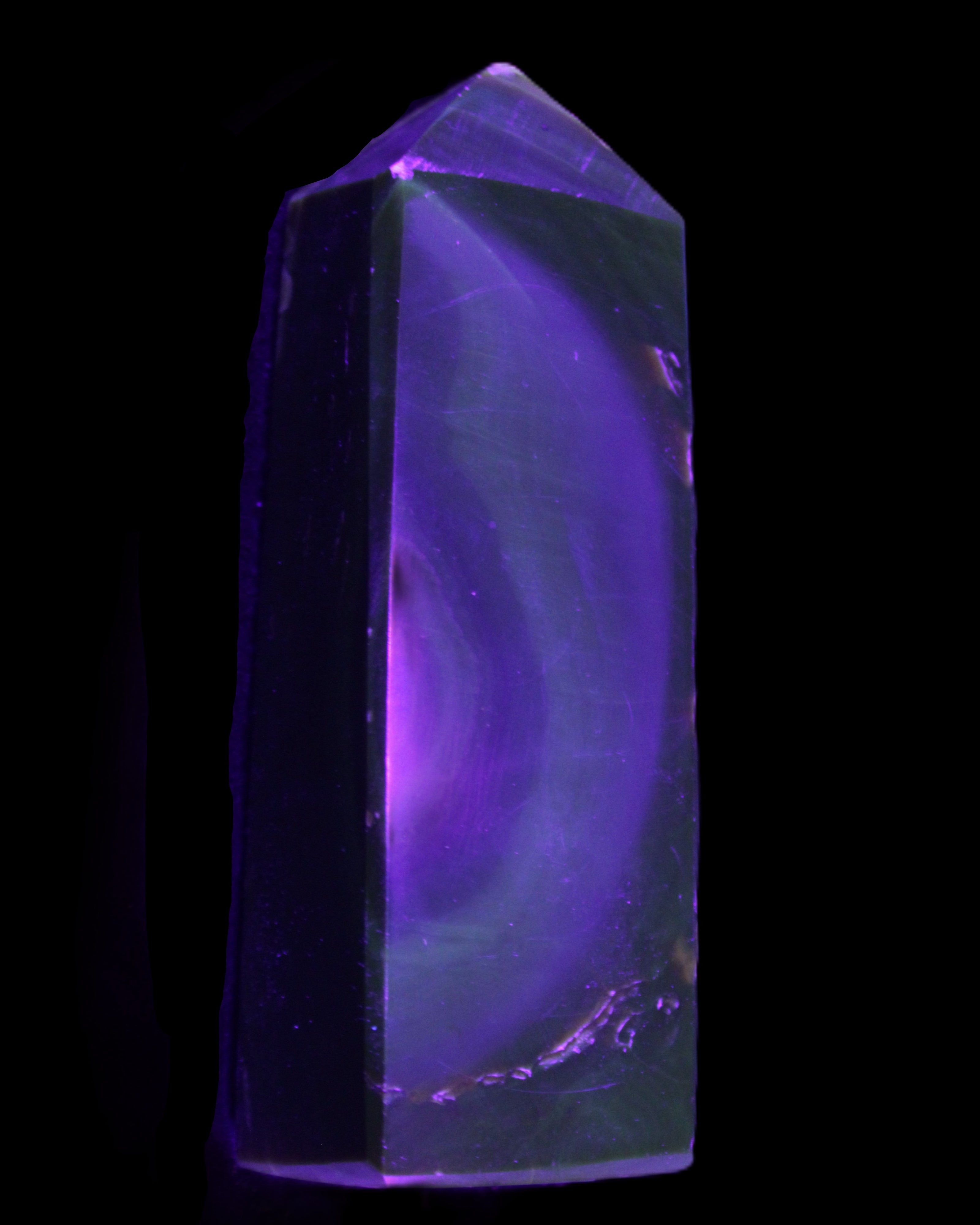 Chocolate Calcite obelisk 93*33mm 177g in UV light - Rocks and Things Store