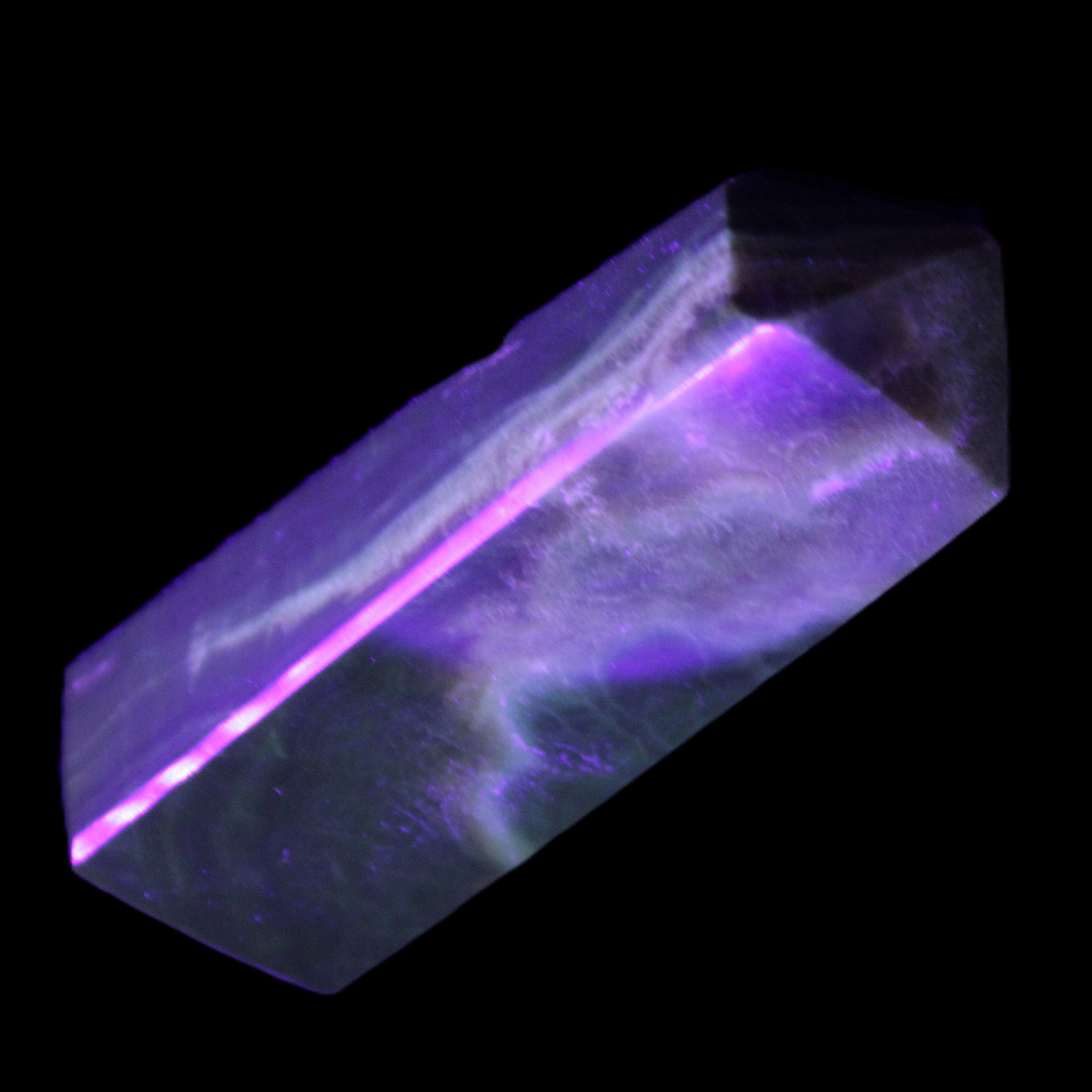 Chocolate Calcite obelisk 93*33mm 177g in UV light - Rocks and Things Store