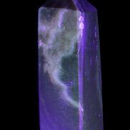 Chocolate Calcite obelisk 93*33mm 177g in UV light - Rocks and Things Store