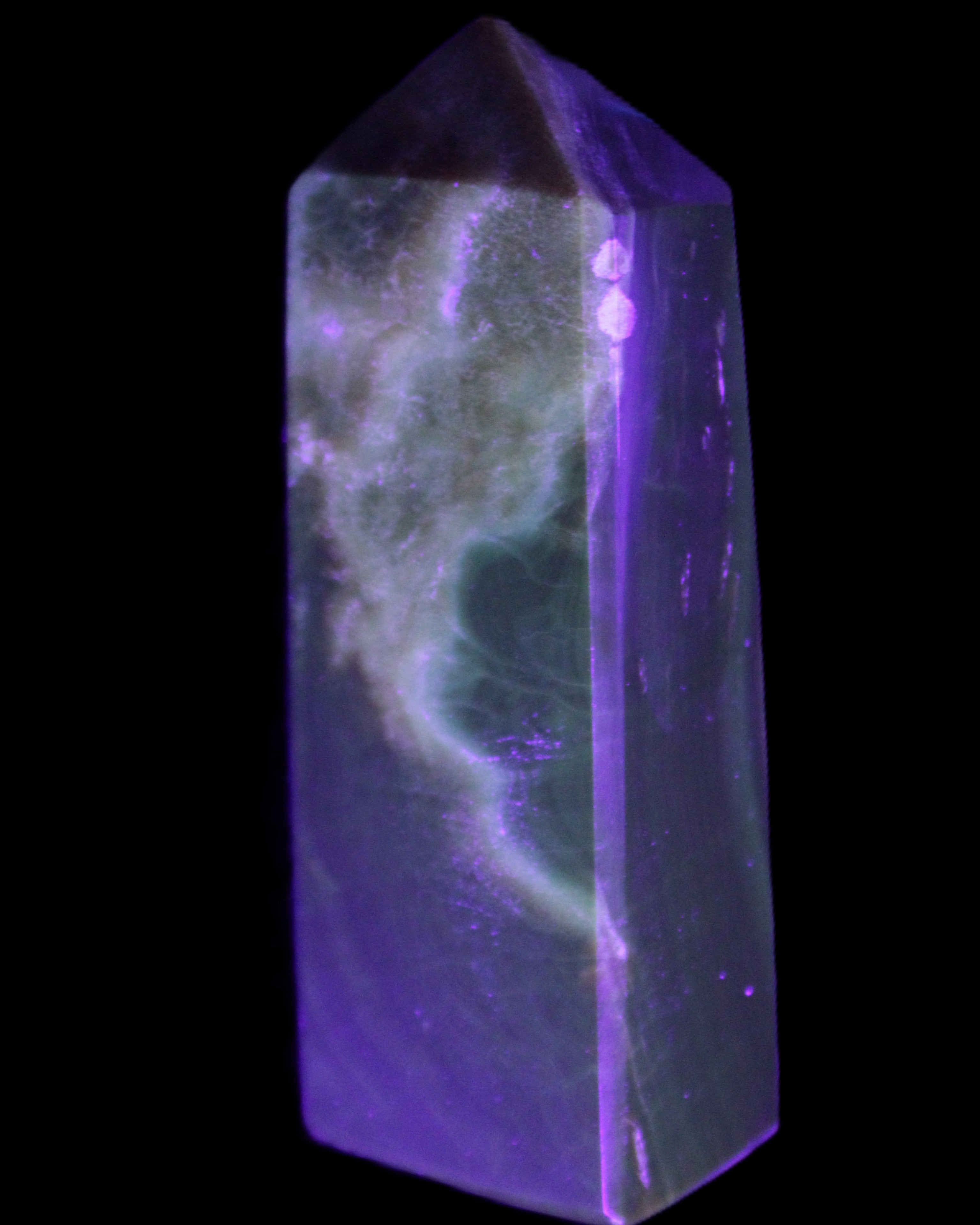Chocolate Calcite obelisk 93*33mm 177g in UV light - Rocks and Things Store