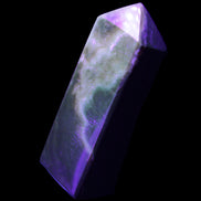 Chocolate Calcite obelisk 93*33mm 177g in UV light - Rocks and Things Store