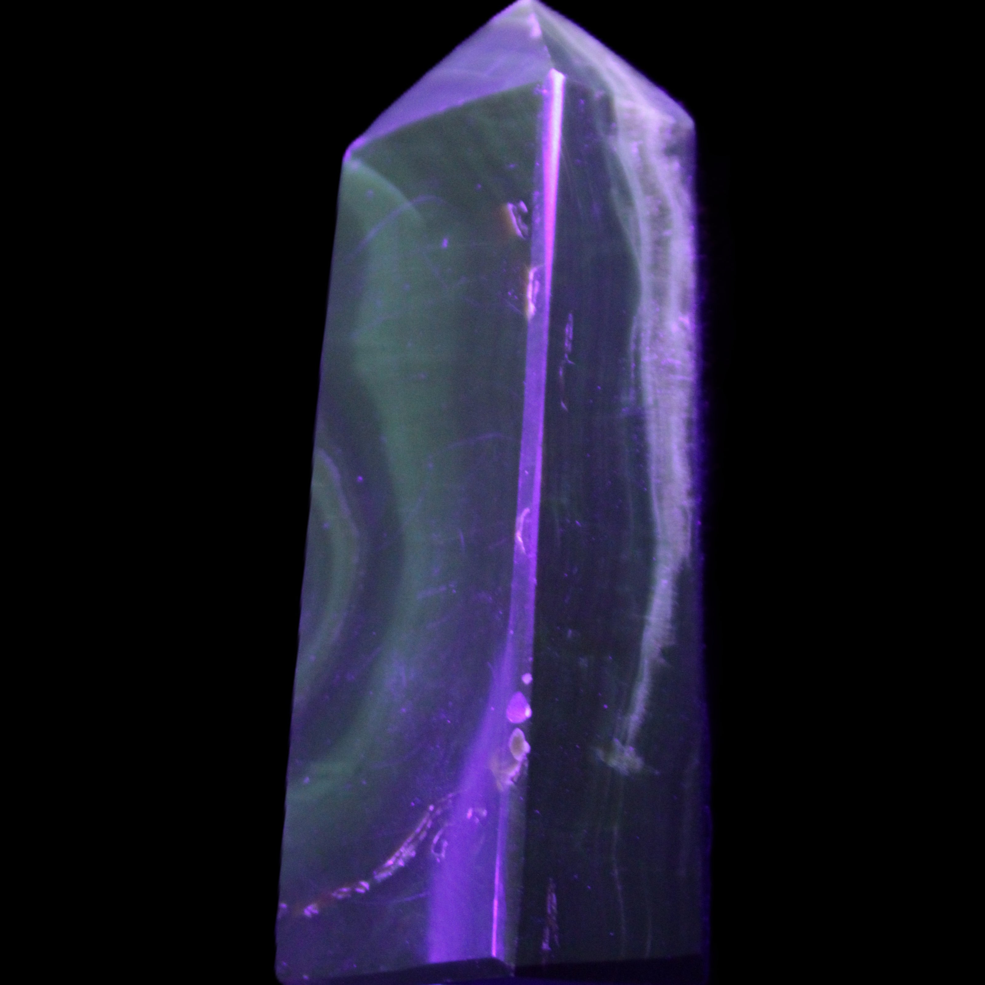 Chocolate Calcite obelisk 93*33mm 177g in UV light - Rocks and Things Store