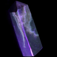 Chocolate Calcite obelisk 93*33mm 177g in UV light - Rocks and Things Store