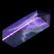 Chocolate Calcite obelisk 93*33mm 177g in UV light - Rocks and Things Store