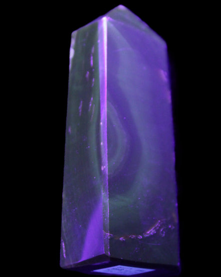 Chocolate Calcite obelisk 93*33mm 177g in UV light - Rocks and Things Store