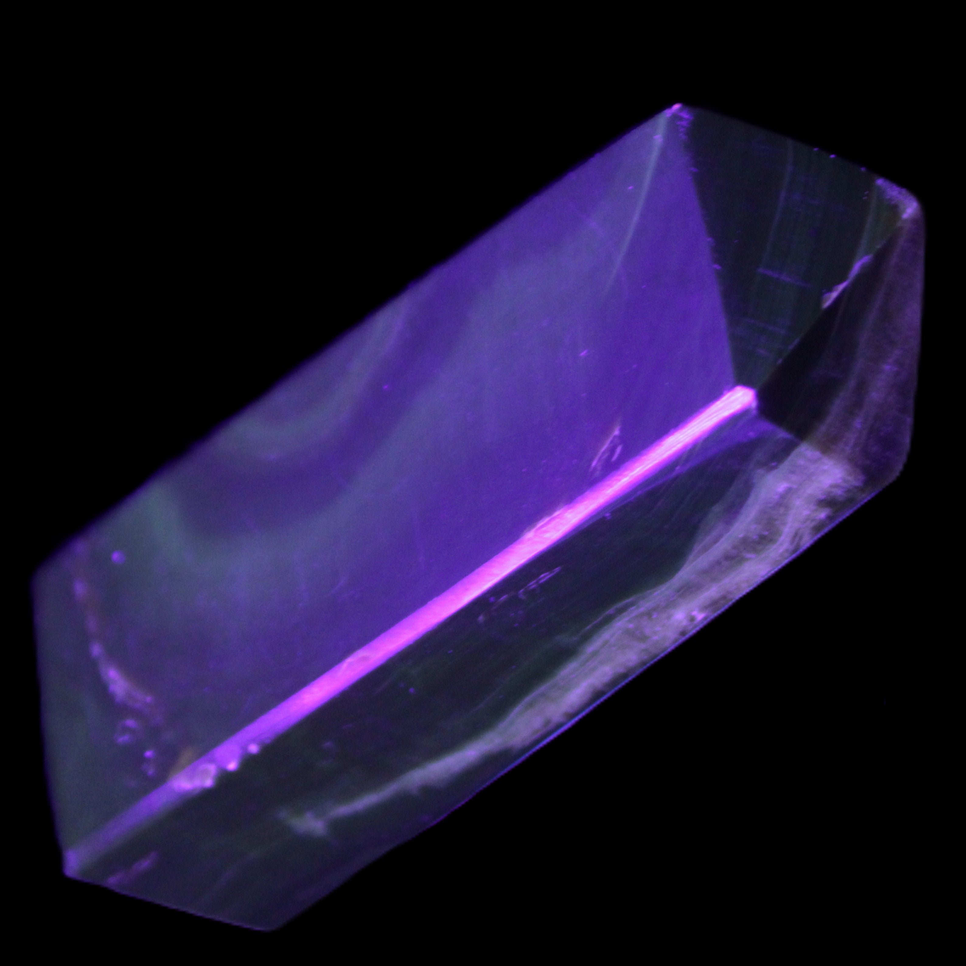 Chocolate Calcite obelisk 93*33mm 177g in UV light - Rocks and Things Store