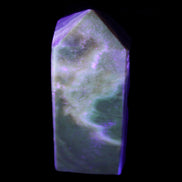 Chocolate Calcite obelisk 93*33mm 177g in UV light - Rocks and Things Store