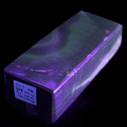 Chocolate Calcite obelisk 93*33mm 177g in UV light - Rocks and Things Store