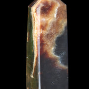 Chocolate Calcite obelisk 93*33mm 177g in UV light - Rocks and Things Store
