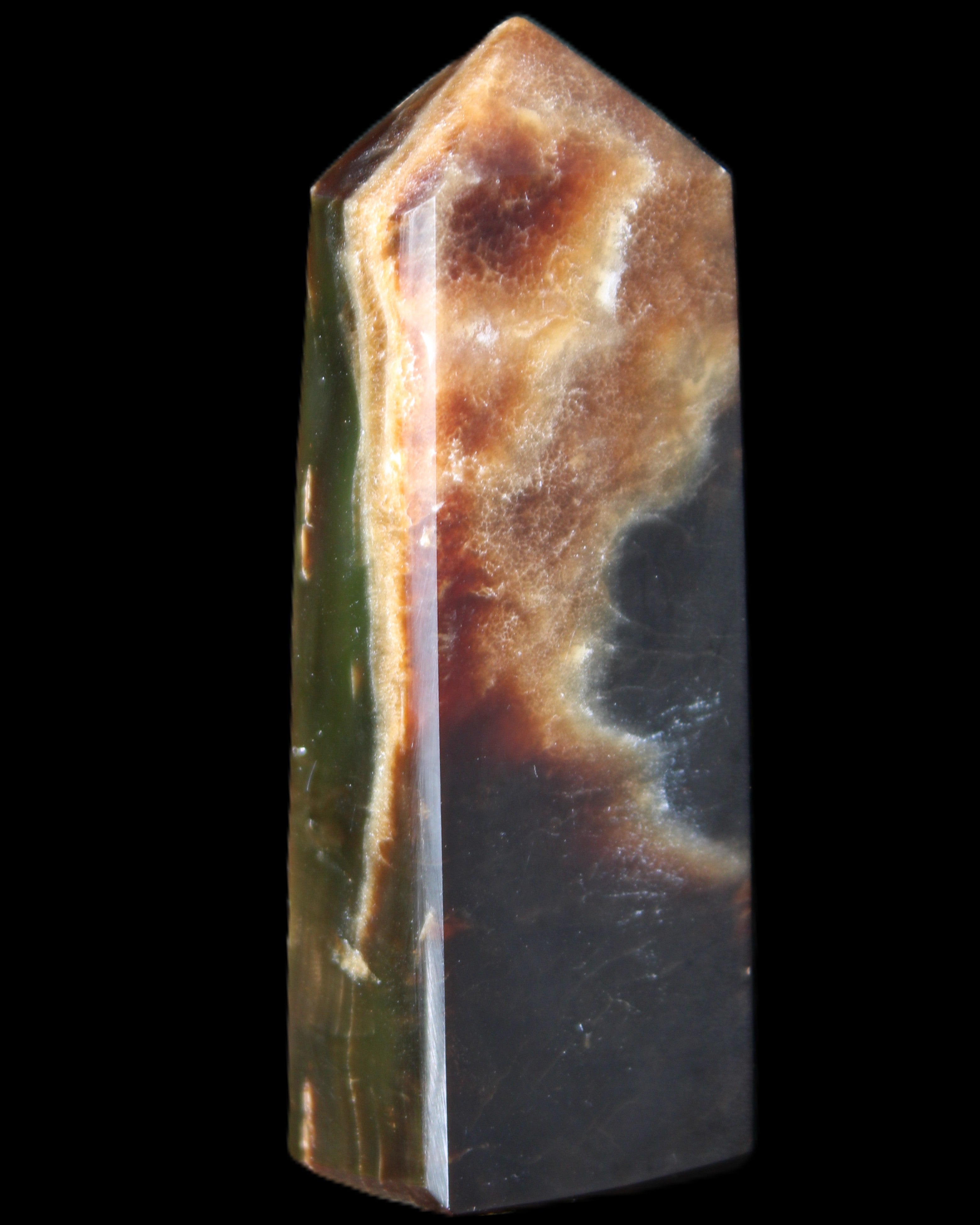 Chocolate Calcite obelisk 93*33mm 177g in UV light - Rocks and Things Store