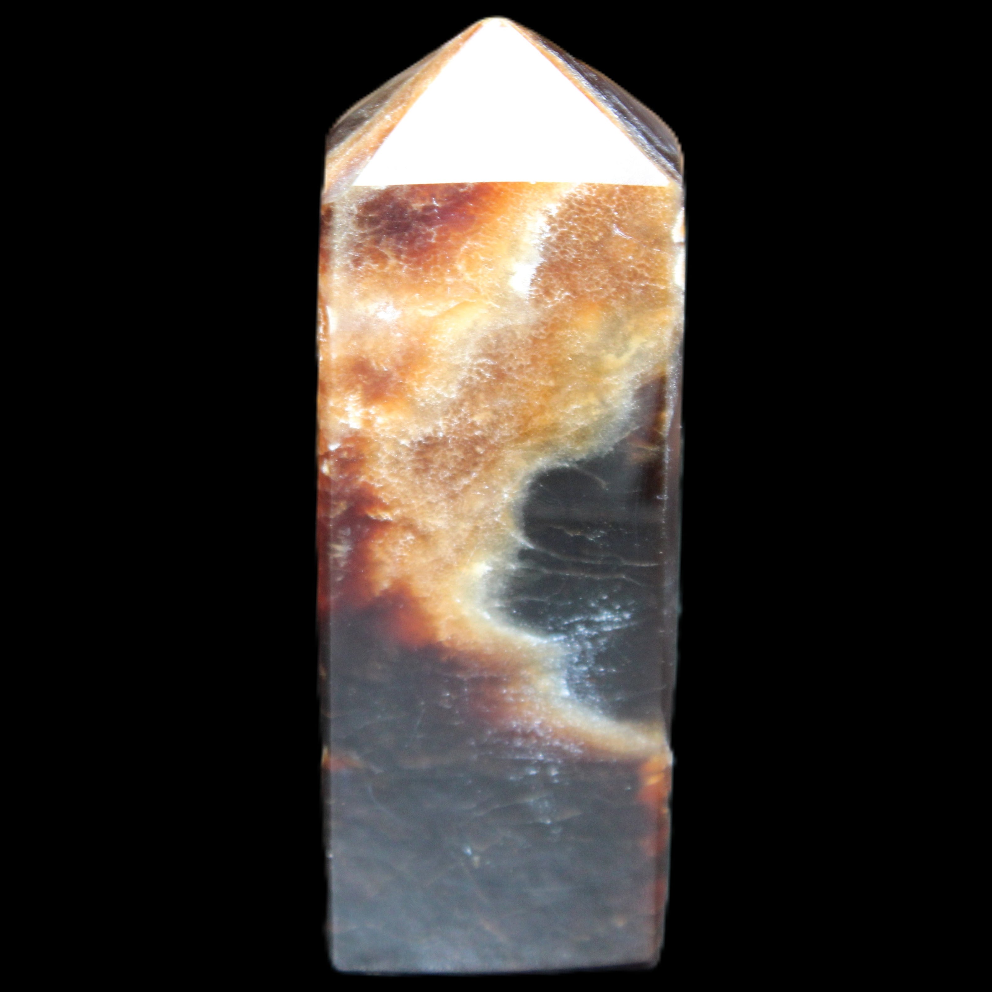 Chocolate Calcite obelisk 93*33mm 177g in UV light - Rocks and Things Store