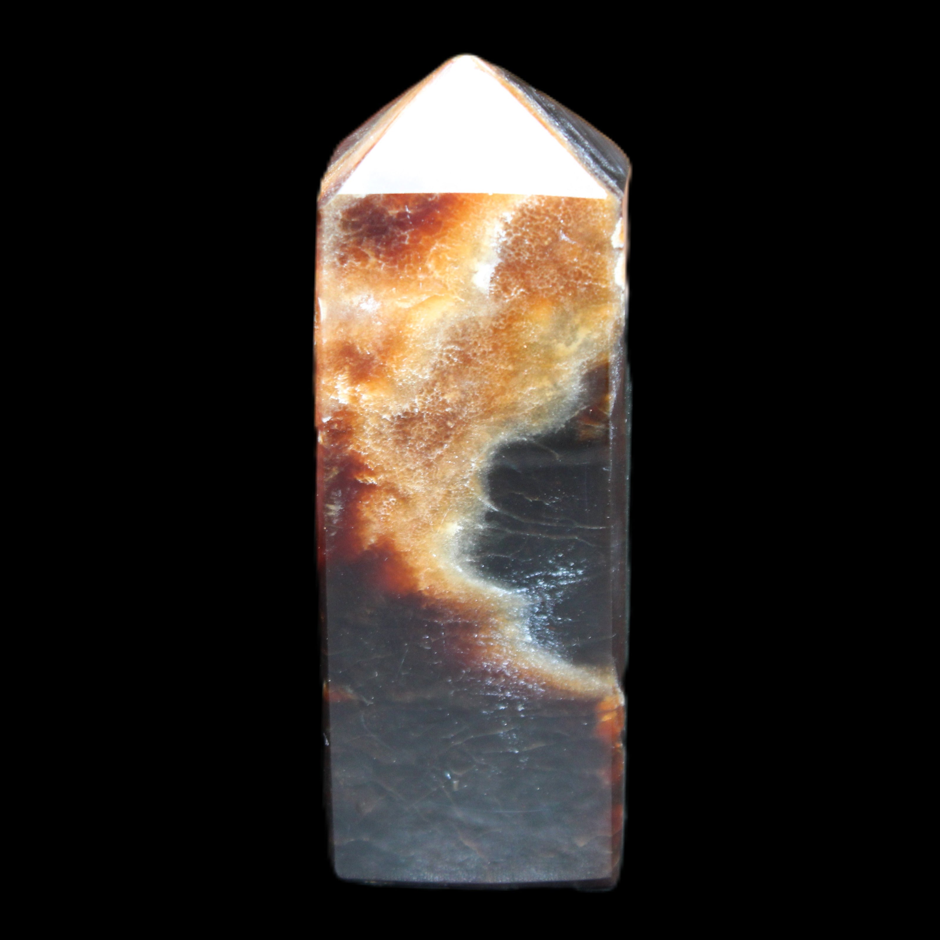 Chocolate Calcite obelisk 93*33mm 177g in UV light - Rocks and Things Store