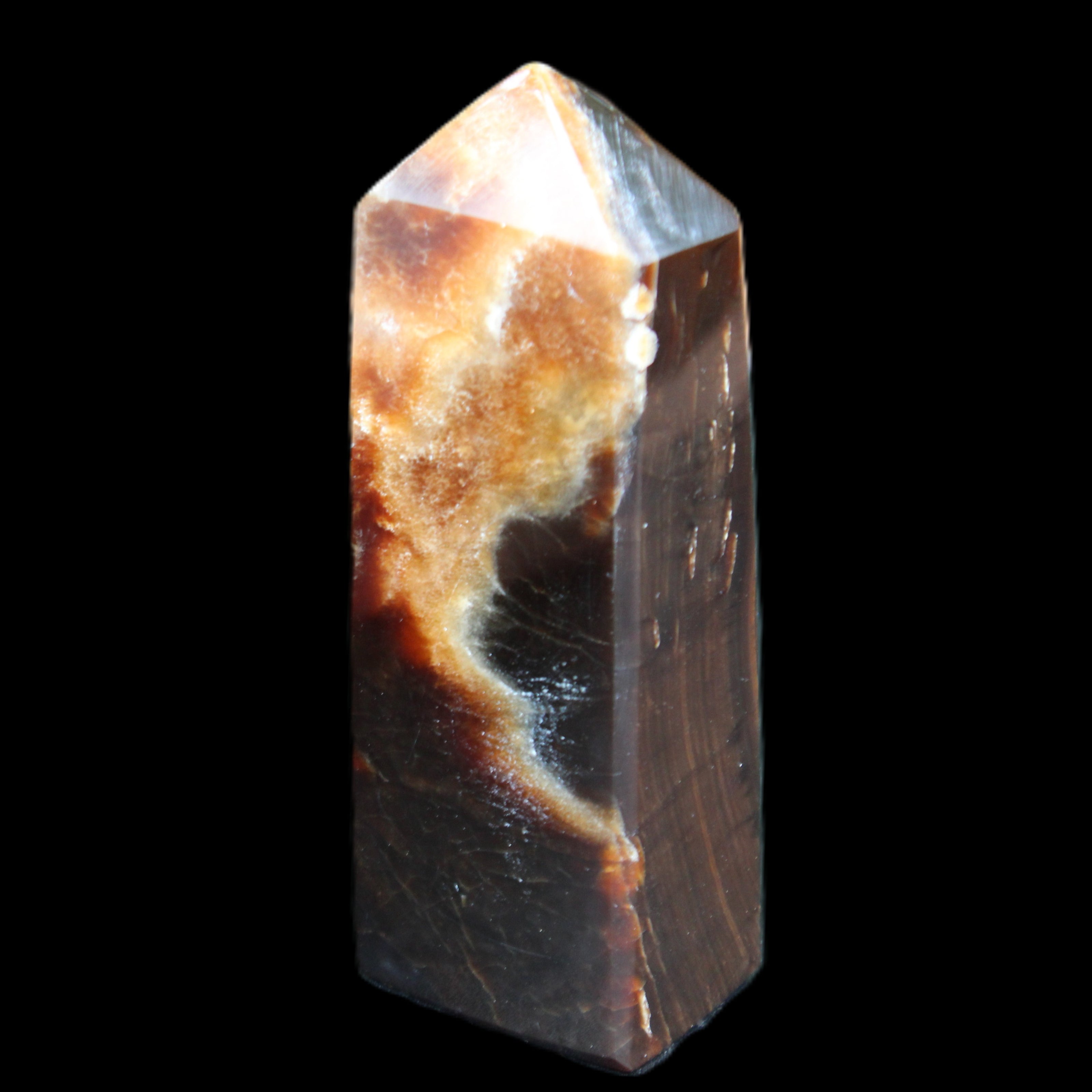 Chocolate Calcite obelisk 93*33mm 177g in UV light - Rocks and Things Store