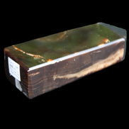 Chocolate Calcite obelisk 93*33mm 177g in UV light - Rocks and Things Store