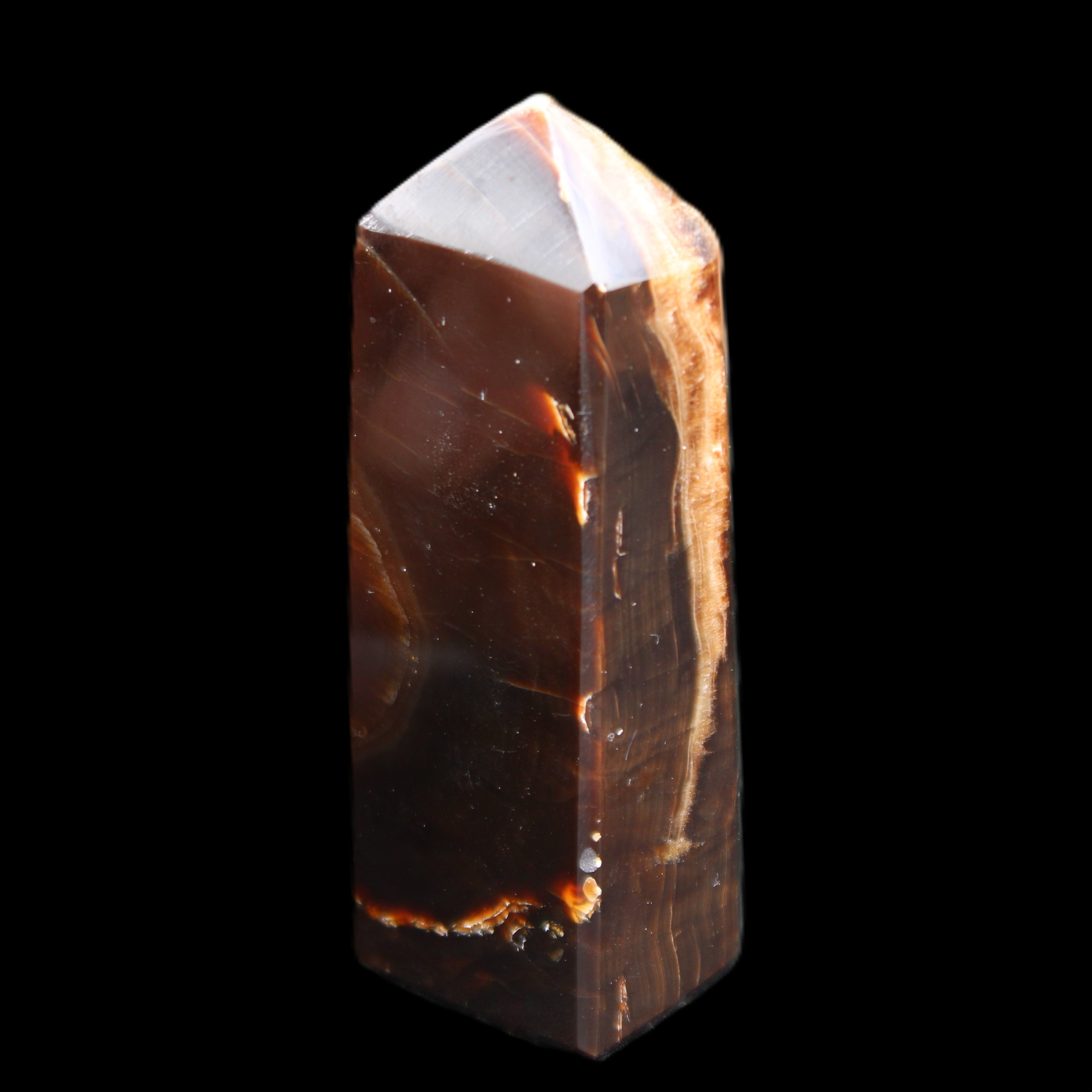 Chocolate Calcite obelisk 93*33mm 177g in UV light - Rocks and Things Store