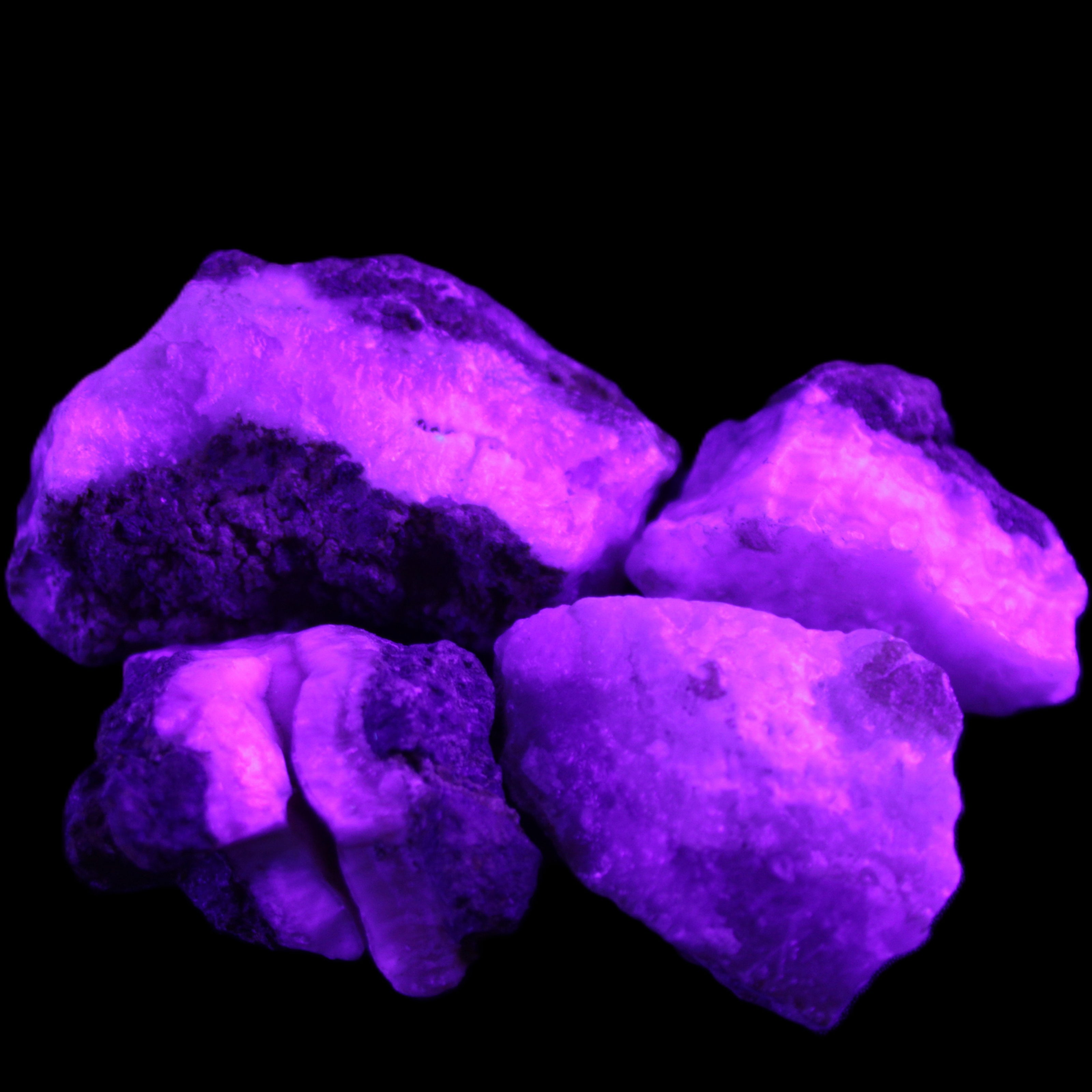 Pink Aragonite with ironstone 4 stones 40-58mm 175g in UV light - Rocks and Things Store