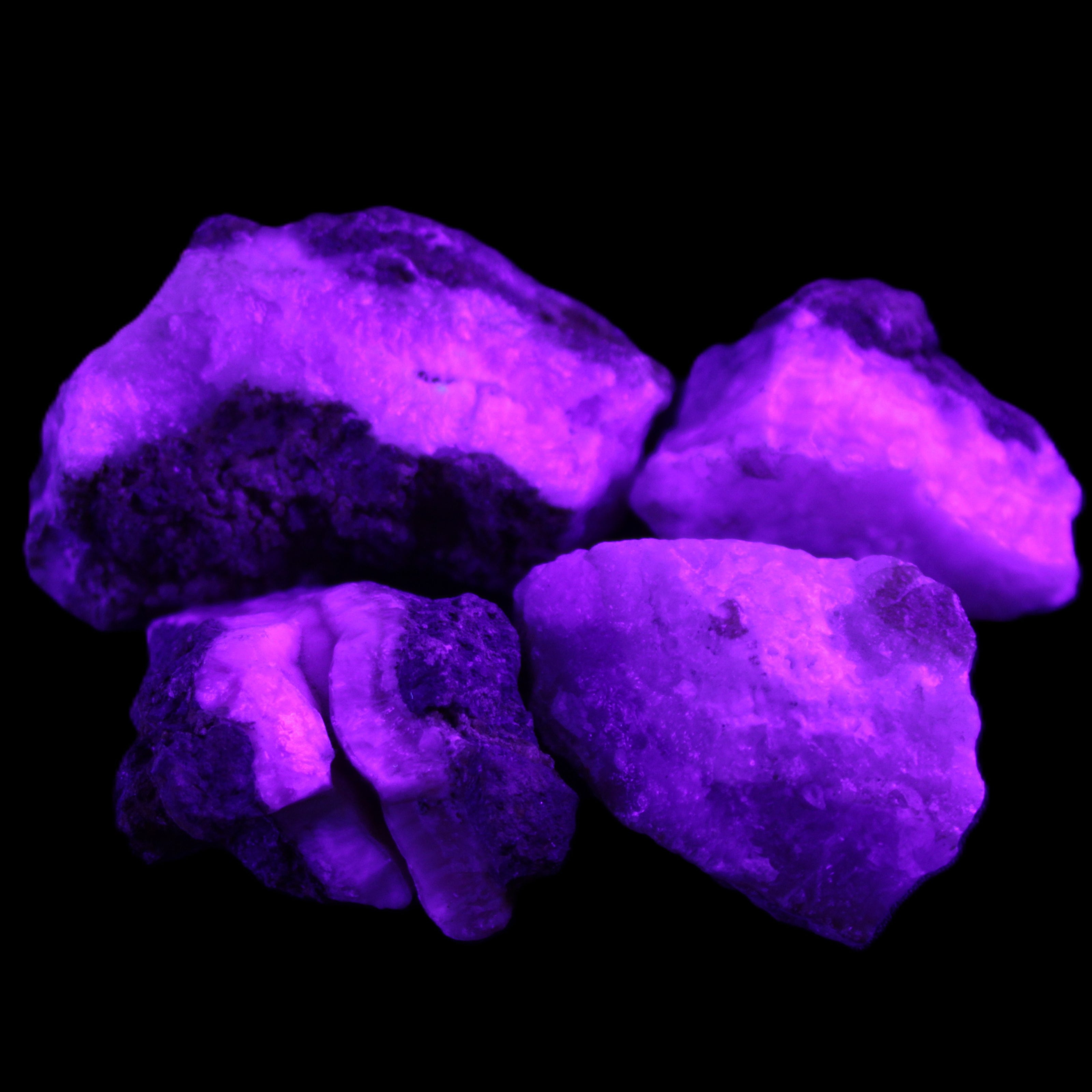 Pink Aragonite with ironstone 4 stones 40-58mm 175g in UV light - Rocks and Things Store