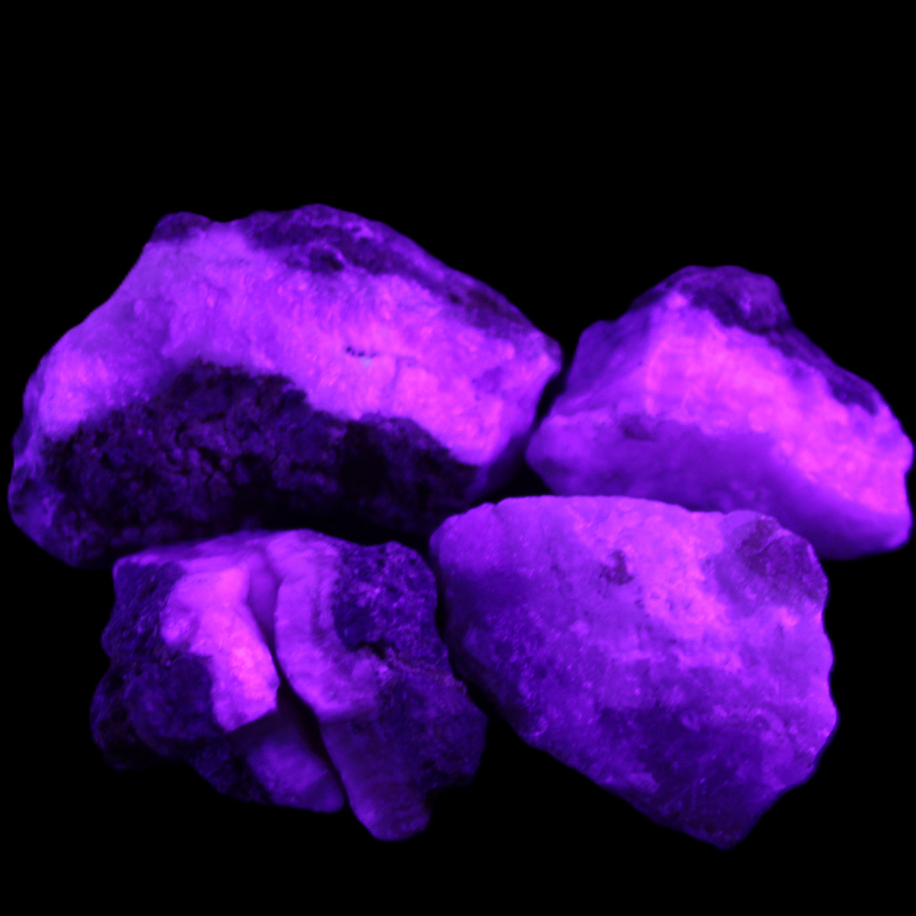 Pink Aragonite with ironstone 4 stones 40-58mm 175g in UV light - Rocks and Things Store