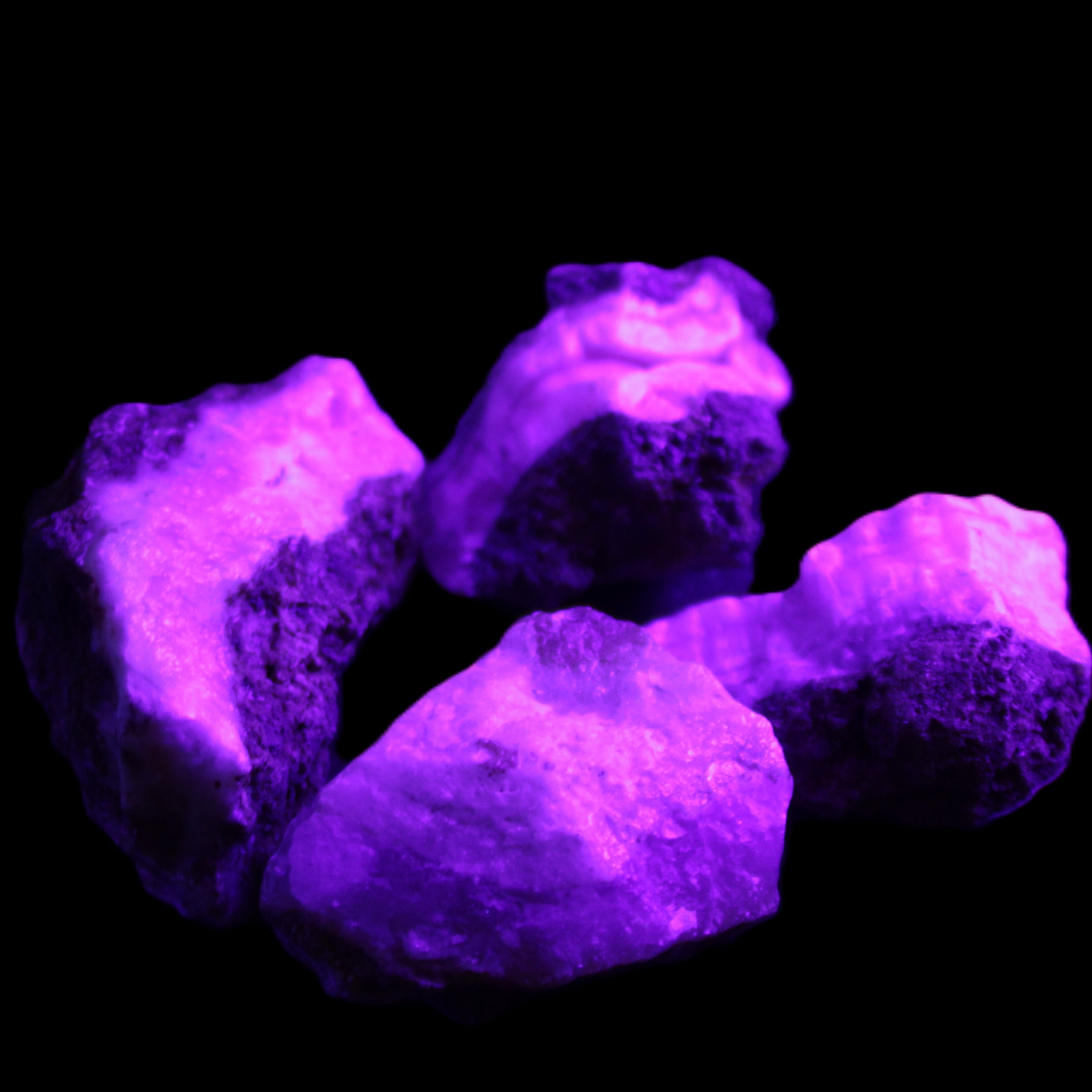 Pink Aragonite with ironstone 4 stones 40-58mm 175g in UV light - Rocks and Things Store