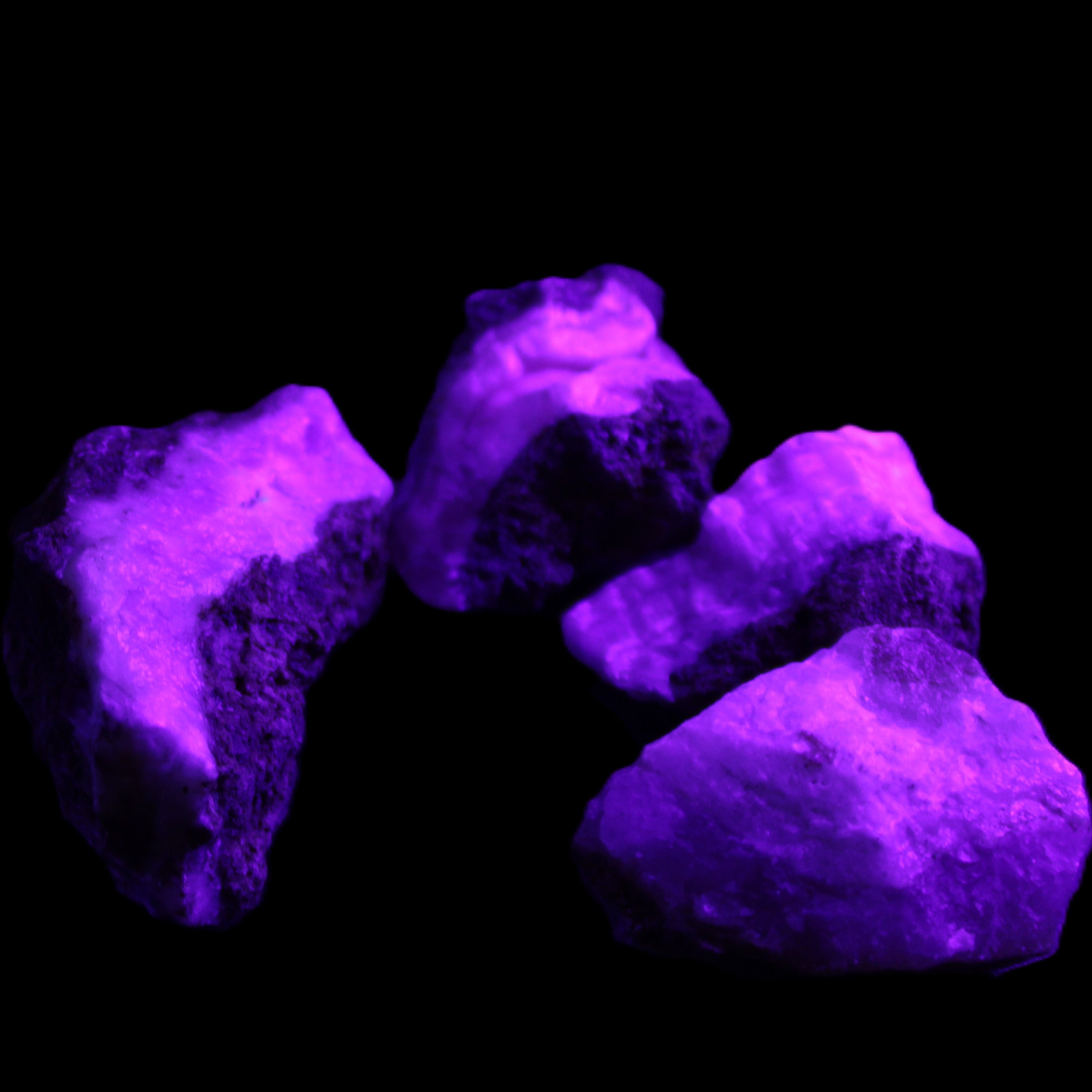 Pink Aragonite with ironstone 4 stones 40-58mm 175g in UV light - Rocks and Things Store