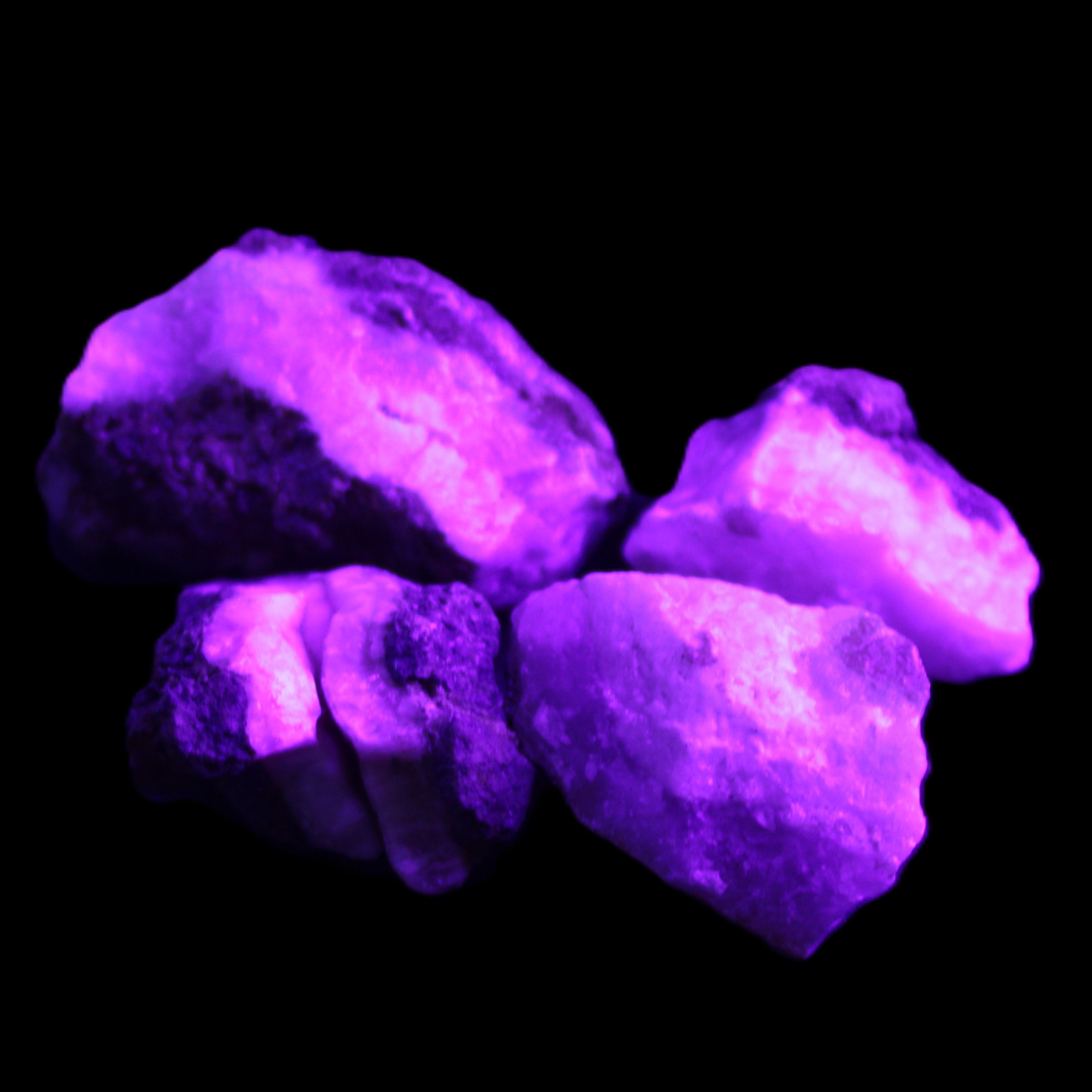 Pink Aragonite with ironstone 4 stones 40-58mm 175g in UV light - Rocks and Things Store