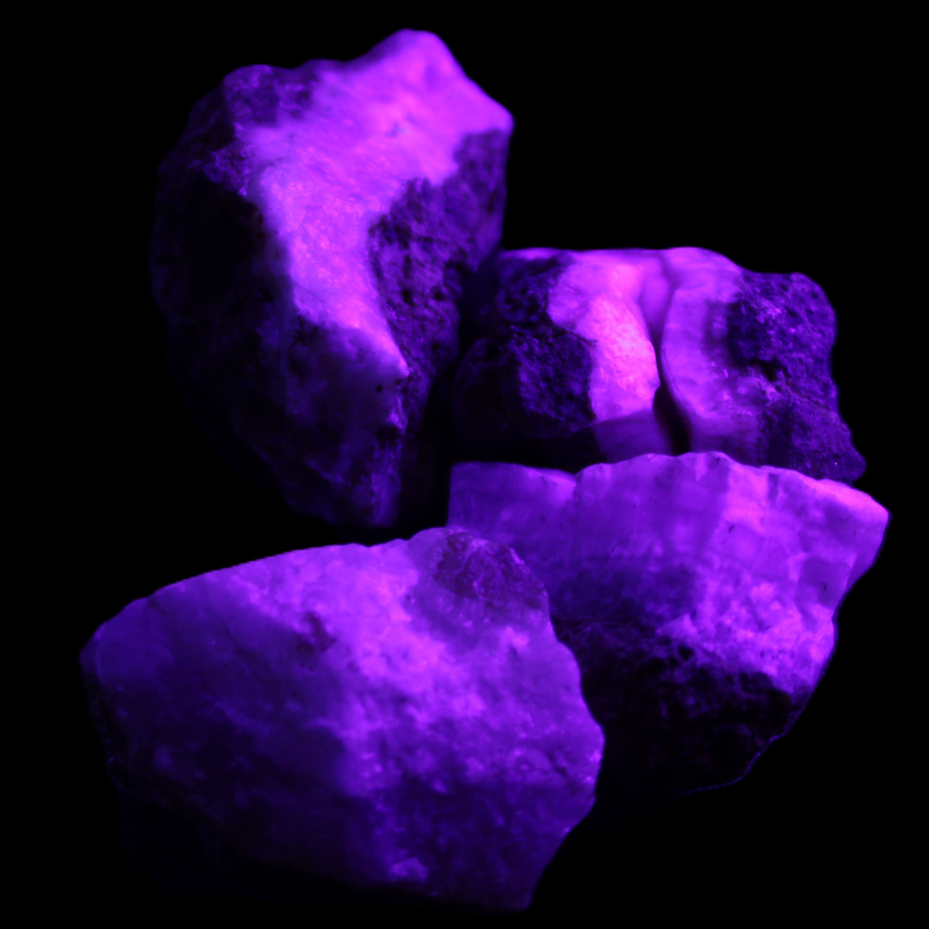 Pink Aragonite with ironstone 4 stones 40-58mm 175g in UV light - Rocks and Things Store