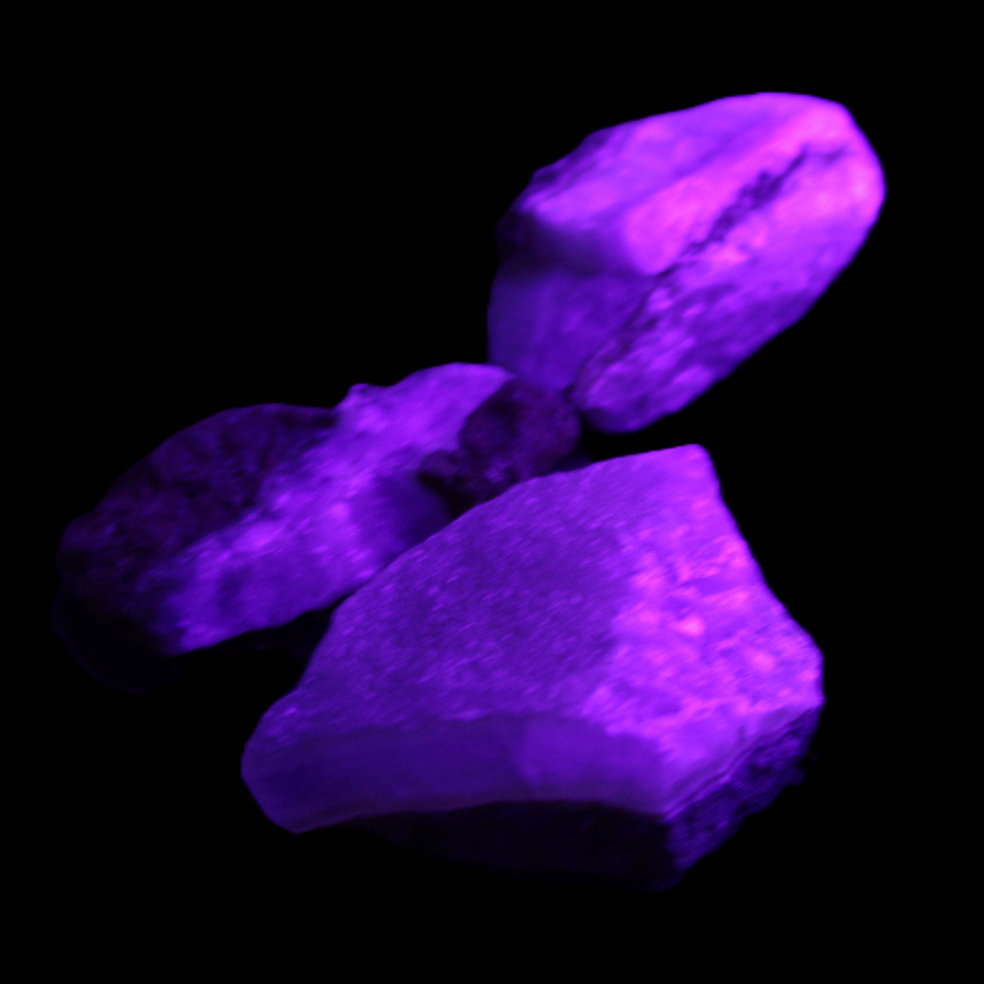 Pink Aragonite 3 stones 30-50mm 50g in UV light - Rocks and Things Store