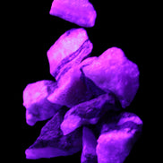 Pink Aragonite 9 small stones 23-35mm 77g in UV light - Rocks and Things Store