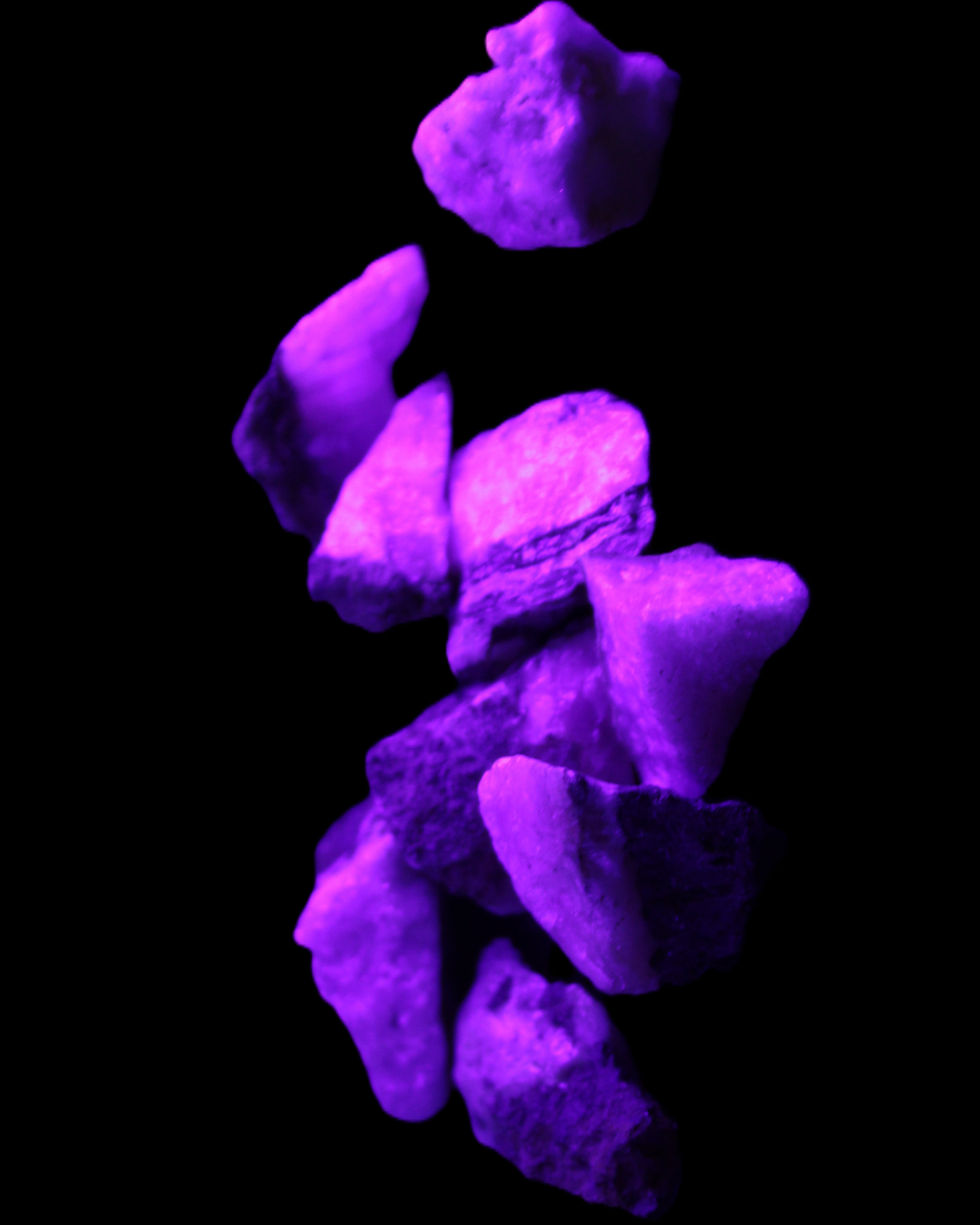 Pink Aragonite 9 small stones 23-35mm 77g in UV light - Rocks and Things Store