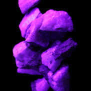 Pink Aragonite 9 small stones 23-35mm 77g in UV light - Rocks and Things Store