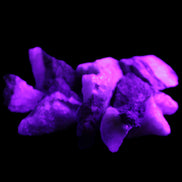 Pink Aragonite 9 small stones 23-35mm 77g in UV light - Rocks and Things Store