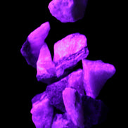 Pink Aragonite 9 small stones 23-35mm 77g in UV light - Rocks and Things Store
