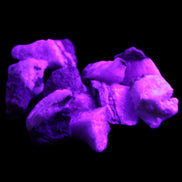 Pink Aragonite 9 small stones 23-35mm 77g in UV light - Rocks and Things Store